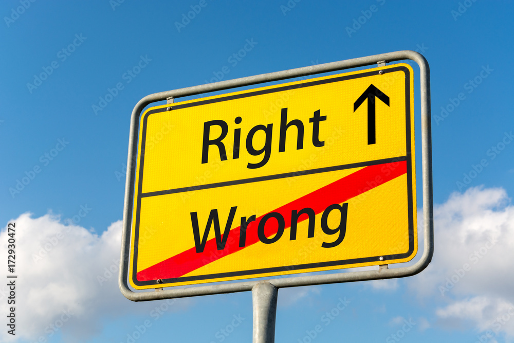 Yellow street sign with Right ahead leaving Wrong behind Yellow street sign with Right ahead leaving Wrong behind