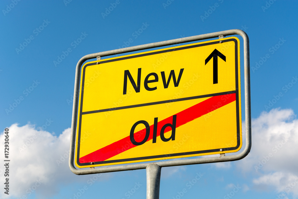 Yellow street sign with New ahead leaving Old behind Yellow street sign with New ahead leaving Old behind