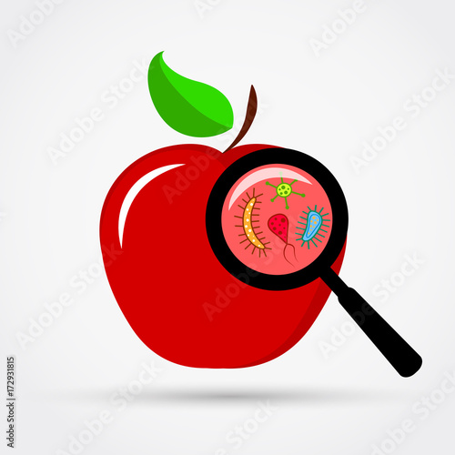 Microbes under magnification on the apple.