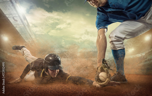 Baseball players in action on the stadium.