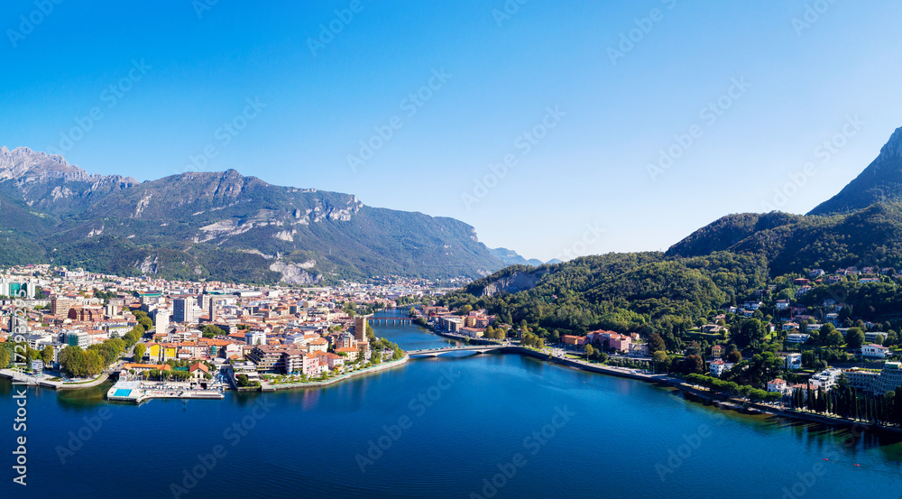 Fototapeta premium Lecco (IT) - Vista aerea panoramica della città e dell'Adda Verso sud