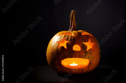 Fotografie Halloween Pumpkin On A Black Background