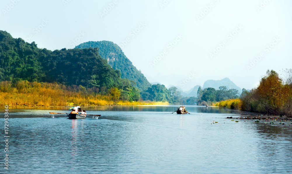 Traveling by boat on streams YEN in Hanoi, Vietnam. 