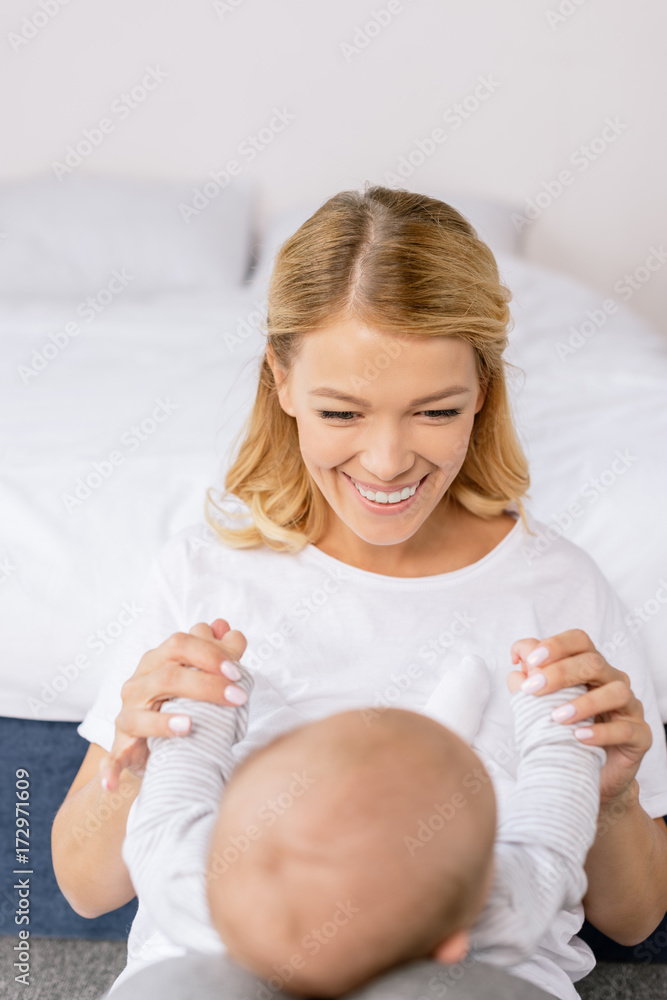 mother playing with baby mother playing with baby