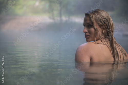 Young Woman Taking a Bath In Hot Spring Outdoor Maibachl Villach Austria