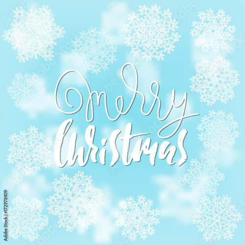 Merry Christmas handwritten lettering design on blur blue background. Vector illustration. White snowflakes winter pattern. EPS 10