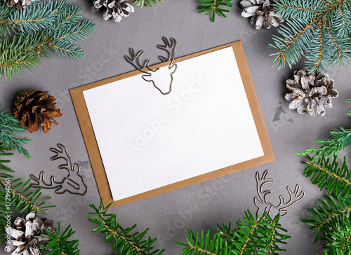 Rustic style Christmas card mock-up with fir branches