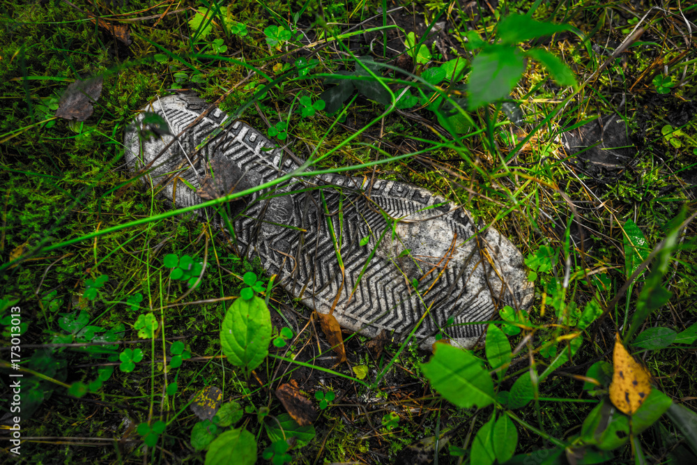 old sneaker dug up in the ground old sneaker dug up in the ground
