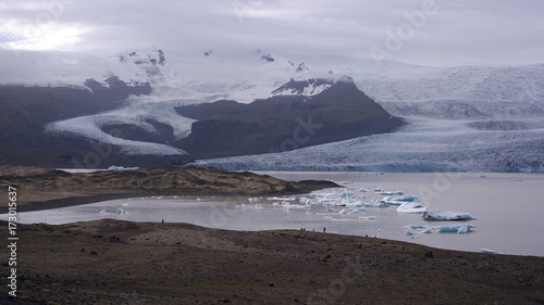 Fjallsárlón glacial lagoon and two glacier tongues which they are a part of Vatnajökull glacier, Iceland