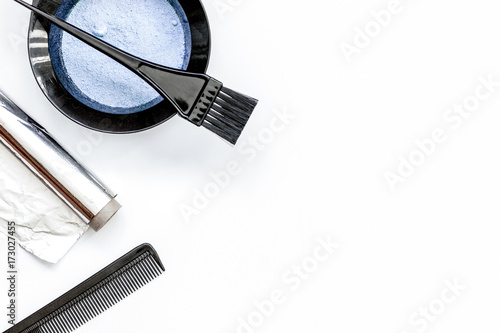 Fotografie Tools for hair dye and hairdye top view white background