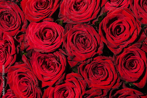 background with red roses bouquet