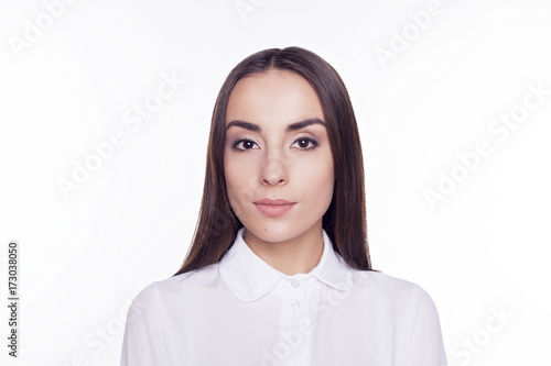 Young businesswoman isolated on white.