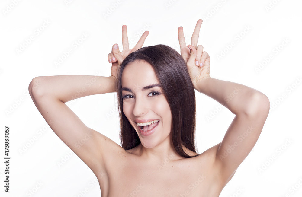 Portrait of a cheerful and smiling young girl isolated on white. Portrait of a cheerful and smiling young girl isolated on white.