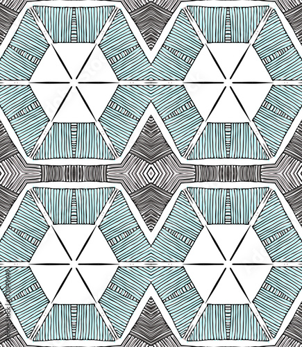 Seamless striped vector pattern. Vintage colored decorative repainting background with tribal and ethnic motifs. Abstract geometric roughly hatched shapes colored with hand drawn brush stokes.