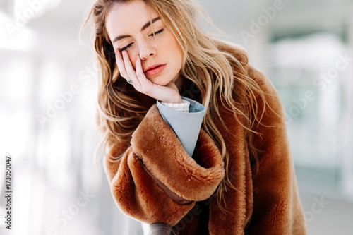Woman touching her face