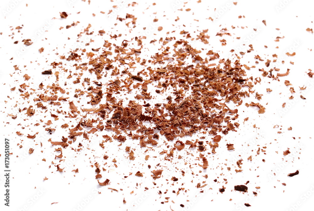 Pile chopped, milled chocolate shavings isolated on white