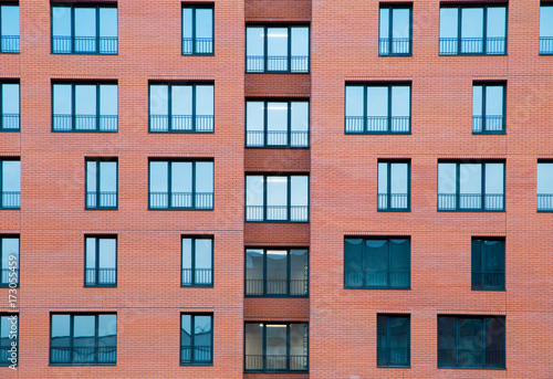 Architectural Exterior Detail of Residential Apartment Building with Brick Facade