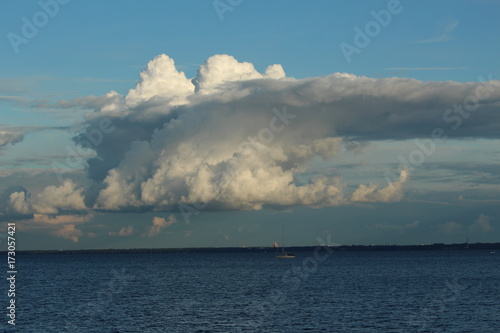 floating yacht on the horizon © Sergey