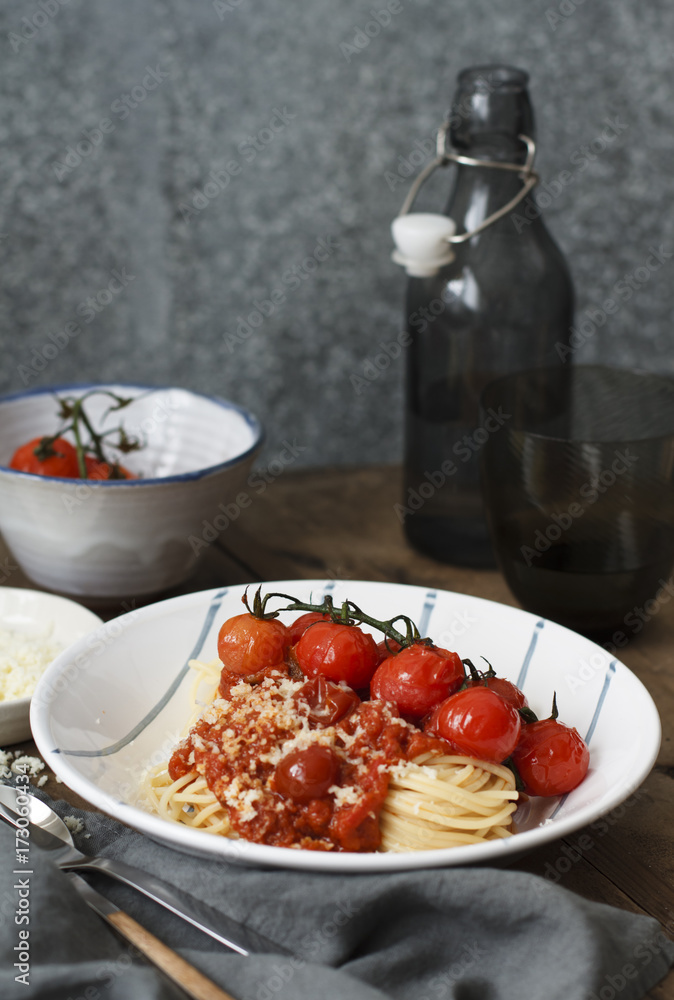 Spaghetti with cherry tomatoes and Parmesan cheese Spaghetti with cherry tomatoes and Parmesan cheese