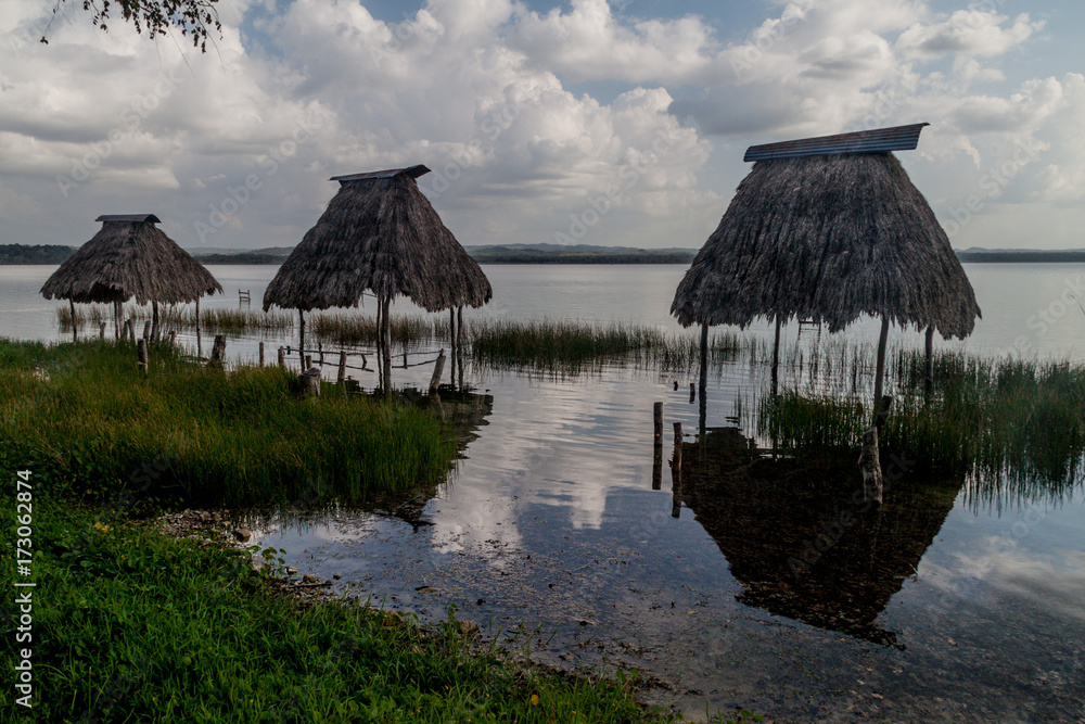 Huts at Peten Itza lake, Guatemala Huts at Peten Itza lake, Guatemala
