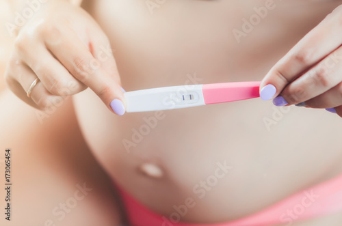 a pregnant girl on a large term with the test