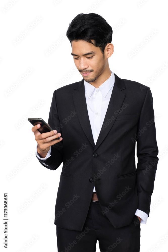 Young handsome asian business man using smartphone contact with partner while standing isolated white background,business people concept Young handsome asian business man using smartphone contact with partner while standing isolated white background,business people concept