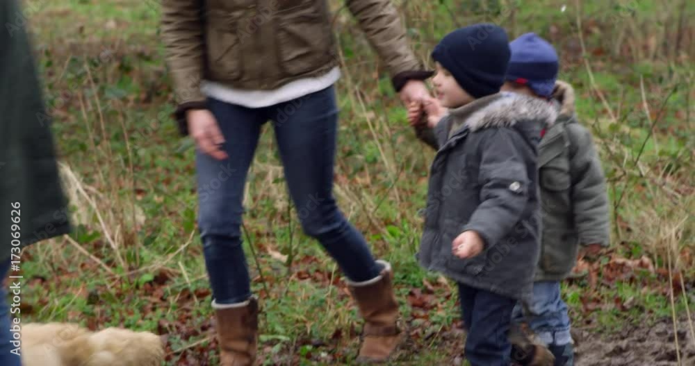 Family On Winter Walk In Countryside With Dog Shot On R3D Family On Winter Walk In Countryside With Dog Shot On R3D
