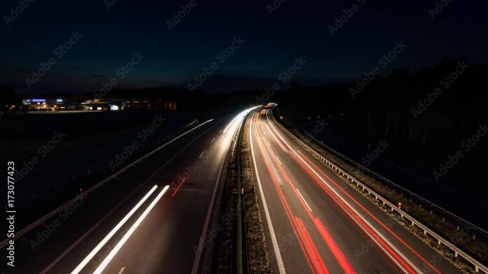 car lights at rush hour on an motorway junction, traffic timelapse car lights at rush hour on an motorway junction, traffic timelapse