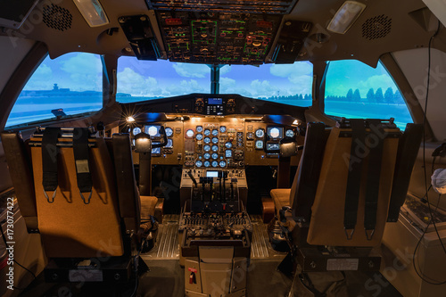 Fototapeta A view of the cockpit of a large commercial airplane, a cockpit trainer