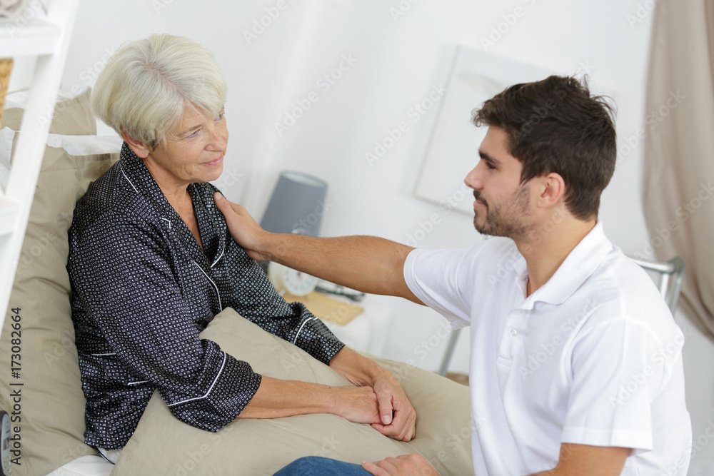 Fototapeta premium picture of a senior woman and a young man