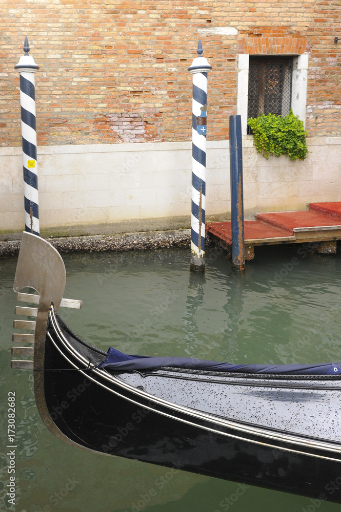 Traditional gondola in the canal of ancient Venice, Italy