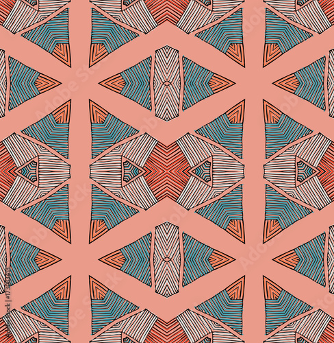 Seamless striped vector pattern. Vintage colored decorative repainting background with tribal and ethnic motifs. Abstract geometric roughly hatched shapes colored with hand drawn brush stokes.