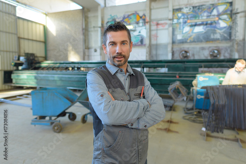 Photos smith posing in the factory