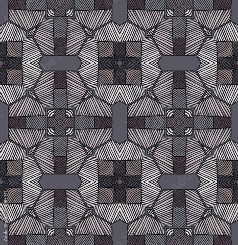 Seamless striped vector pattern. Vintage colored decorative repainting background with tribal and ethnic motifs. Abstract geometric roughly hatched shapes colored with hand drawn brush stokes.