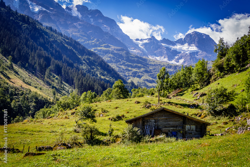 Old barn in the beautiful Lauterbrunnen valley which is a UNESCO world heritage  