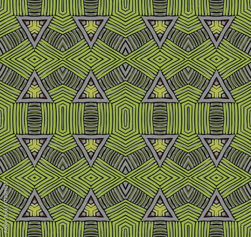 Seamless striped vector pattern. Vintage colored decorative repainting background with tribal and ethnic motifs. Abstract geometric roughly hatched shapes colored with hand drawn brush stokes.