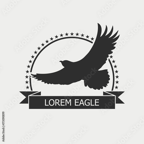 Eagle logo. Emblem template with bird, stars and ribbon. Vector illustration.