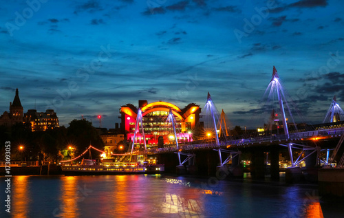 Fotografie, Obraz The Charing Cross station and Hungerford Bridge by the River Thames at night