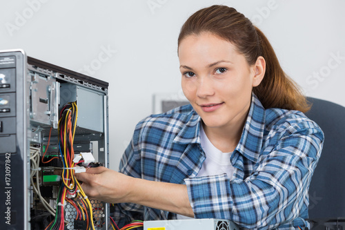 Portrait of female computer repairer