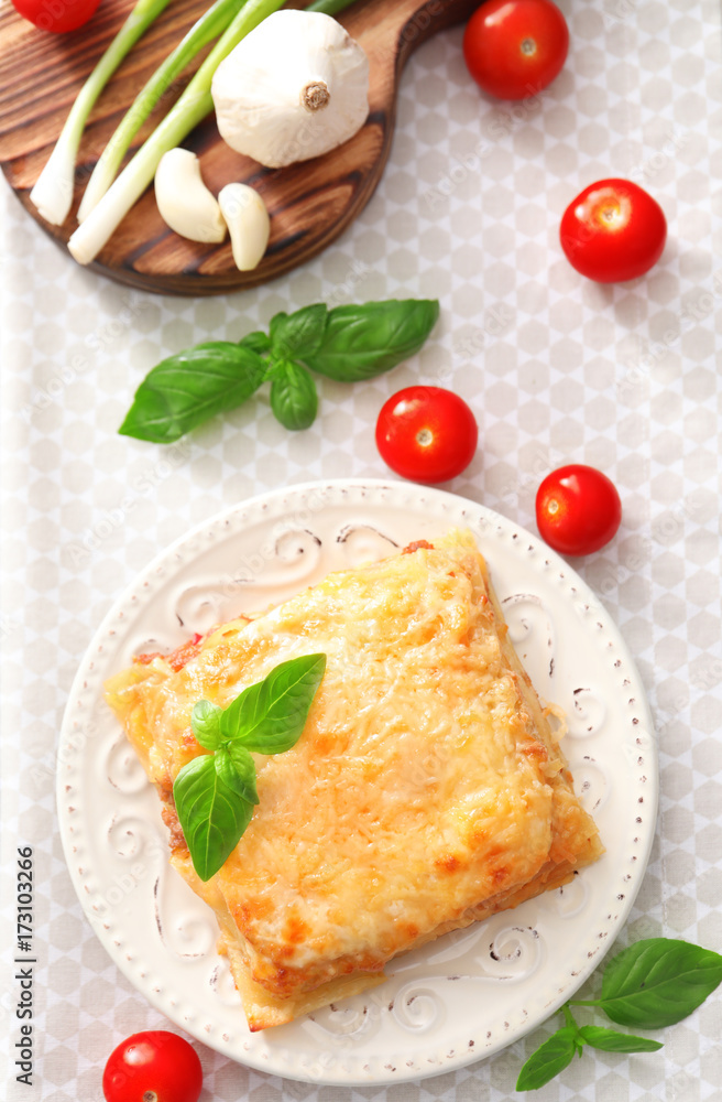 Plate with tasty lasagna on table Plate with tasty lasagna on table