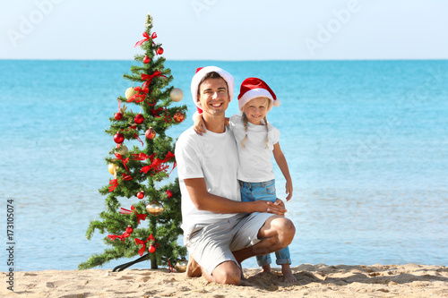 Young father with cute girl...