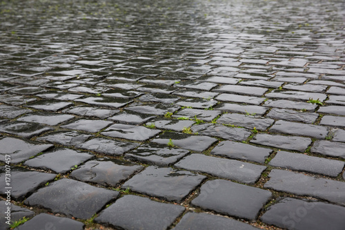 Wet stone pavement texture in the rain