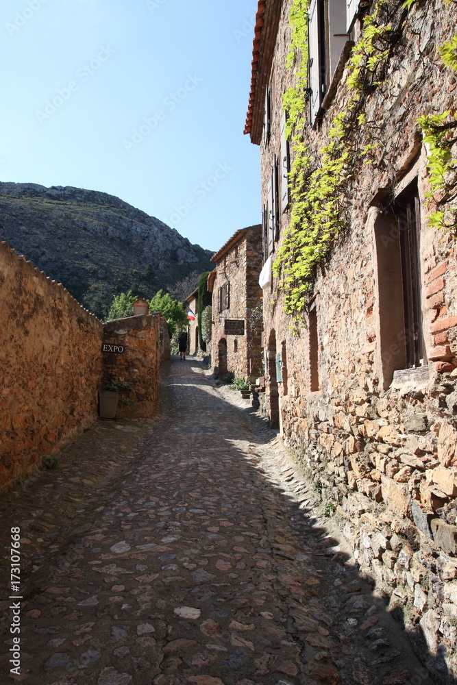 Street in french village of Castelnou in Pyrenees orientales, France