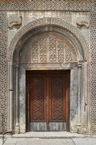 Church door in monastery Geghard in Armenia  