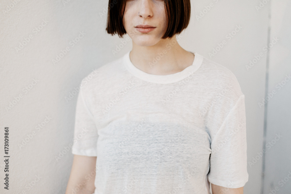 Girl with white shirt tucked in black jeans Girl with white shirt tucked in black jeans