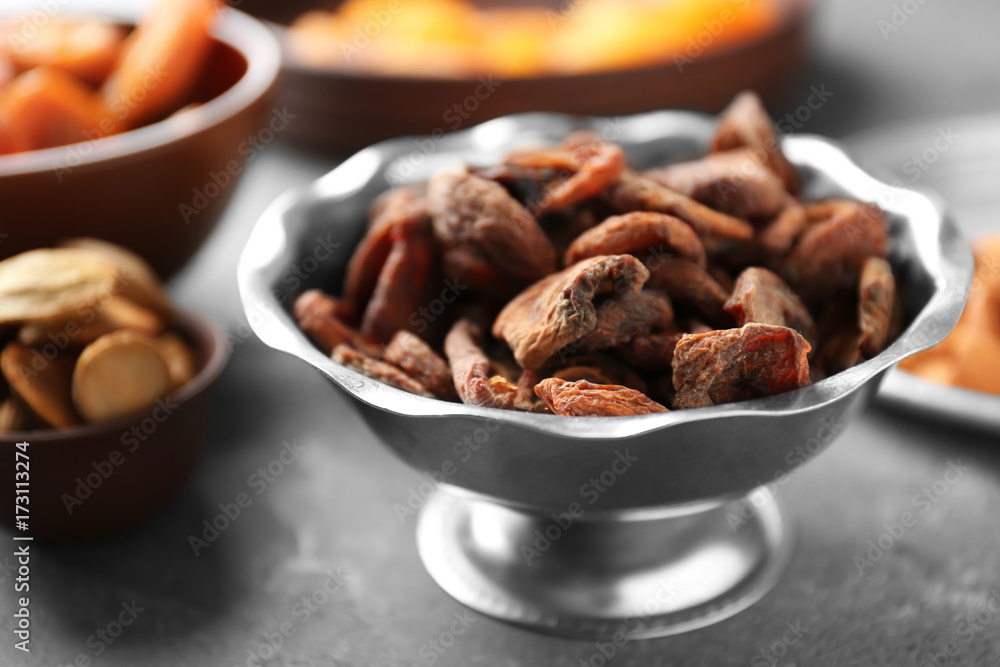 Dried apricots in bowl on table Dried apricots in bowl on table