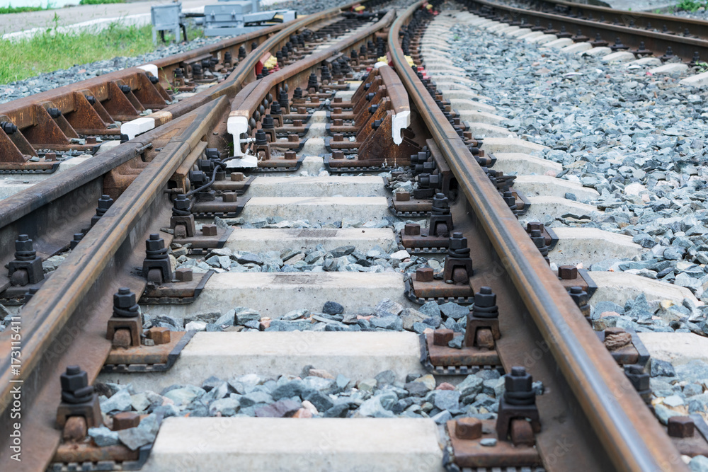 Rails and concrete sleepers. Fork railway. Rail shooter. Between the sleepers and the rails lies the rubble or stones. Branching and the choice of the road. Rails and concrete sleepers. Fork railway. Rail shooter. Between the sleepers and the rails lies the rubble or stones. Branching and the choice of the road.
