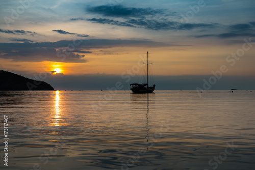 twilight scene of boat at koh phangan in the sunset time