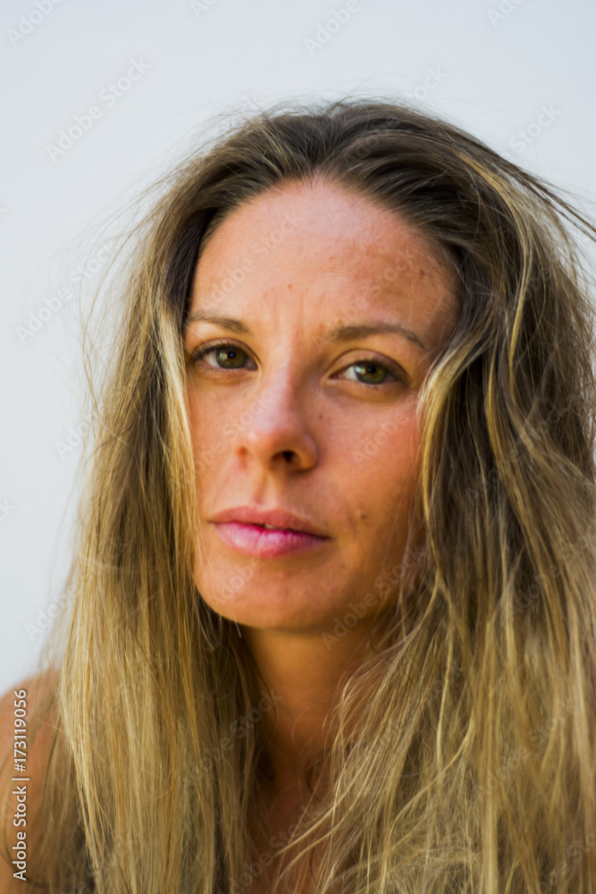 Portrait of the face of a beautiful blond woman on white background Portrait of the face of a beautiful blond woman on white background