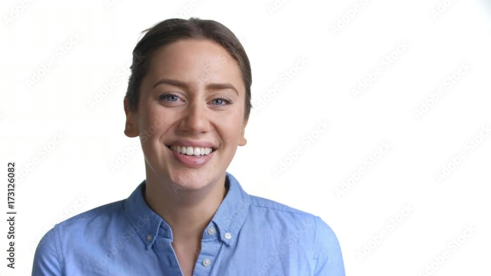 Close Up Of Attractive Young Woman Laughing Into Camera Close Up Of Attractive Young Woman Laughing Into Camera